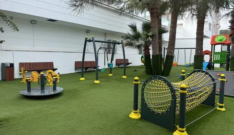 A bright outdoor playground for kids Stock Photos