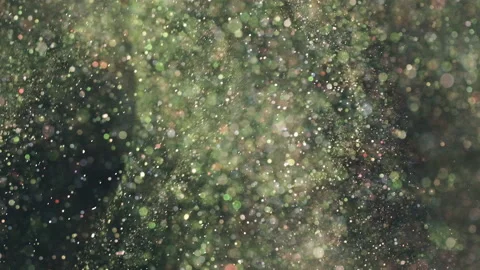 The bright particles floating on the dark background. slow motion Stock Footage 160062024