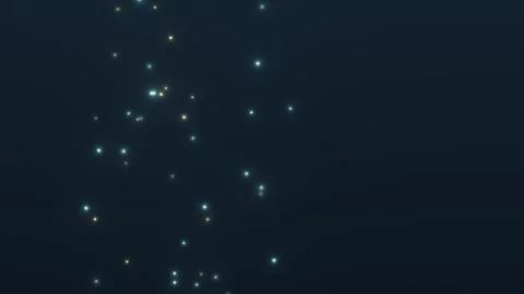 Bright particles floating in dark space create a dynamic Stock Footage 338295525