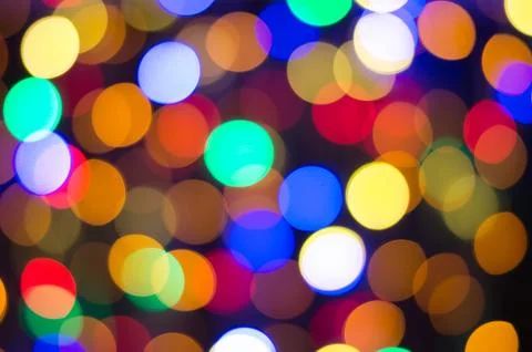 Bright party lights, multi-colored defocussed bokeh background. Stock-Fotos