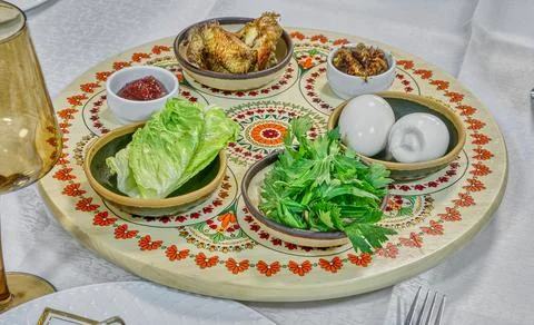 Bright Passover table set with traditional matzah and a beautifully designed  Stock Photos