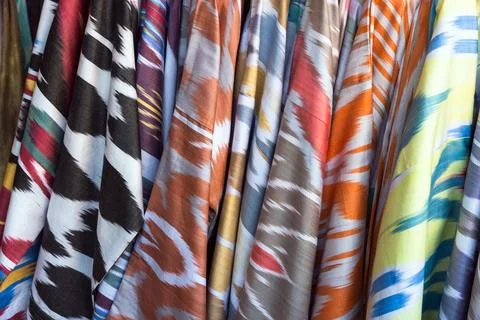 Bright, patterned Ikat fabrics and textiles Stock Photos