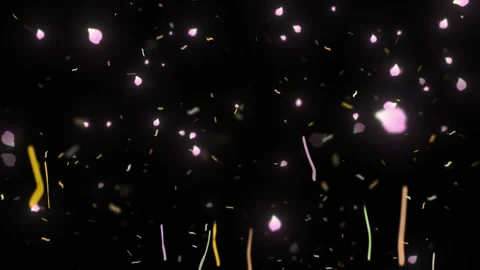 Bright pink fireworks exploding in the night sky with colorful light trails and Stock Footage 346138835