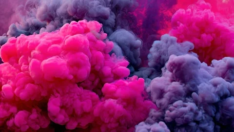 Bright pink smoke cloud spreading in the air Video stock 316822857