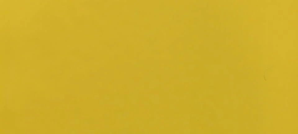 A bright plain yellow surface Stock-Fotos