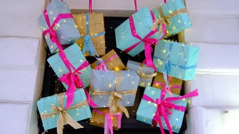 Bright presents with bows and lights Stock Footage 328663136
