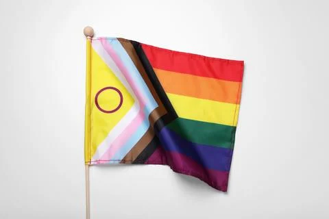 Bright progress flag on white background. LGBT pride Stock Photos