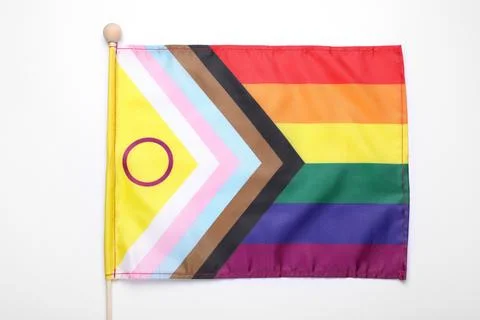 Bright progress flag on white background. LGBT pride Stock Photos