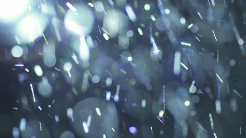 The bright projector light with dust particle flow. Macro close up view Stock Footage 69753648