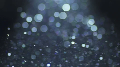 The bright projector light with dust particle stream. Macro close up view Stock Footage 69756701