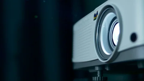 Bright projector light. Dust particles a... | Stock Video | Pond5