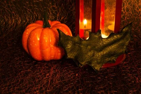 Bright pumpkin on a black background. Halloween and Thanksgiving traditional  Stock Photos