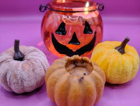 Bright pumpkin lantern bright background macro photography. Halloween Stock Photos