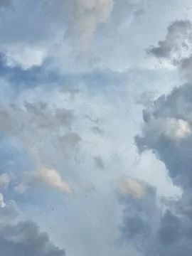 Bright Rain Clouds in Sky Vertical Angle Stock Photos