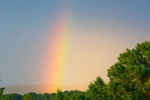 Bright rainbow in the sky Stock Photos