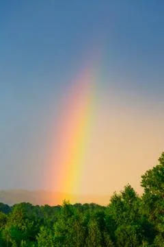 Bright rainbow in the sky Stock Photos