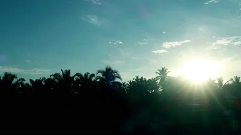 Bright rainbow spectrum sun light ray in sunrise cyan blue sky Video stock 163637280