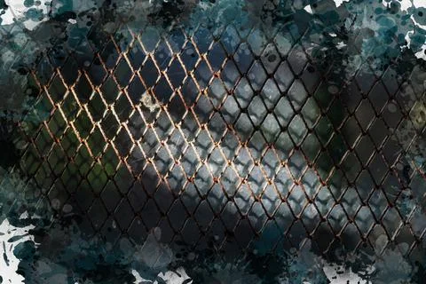 A bright ray of sunlight on a rusty rabiza grid. Metal fence close-up. Stock Photos