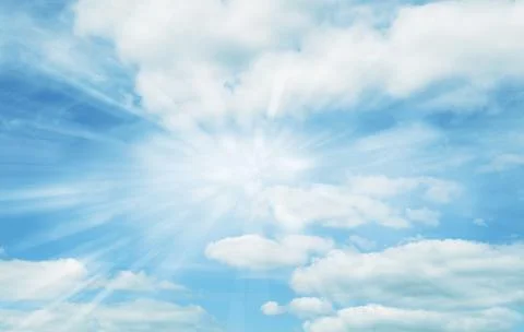 Bright rays shining in clouds Stock Photos