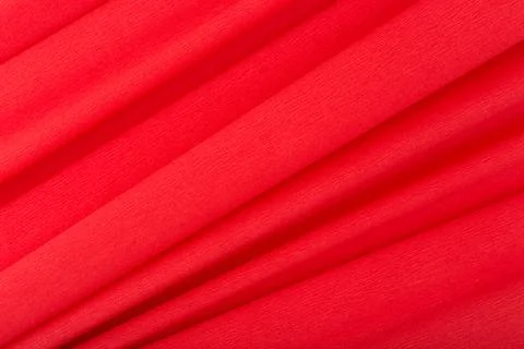 Bright red abstract background with diagonal lines. Flat lay, copy space Stock Photos