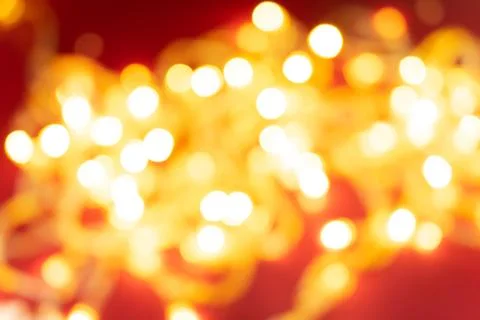 Bright red background. Background with festive bokeh Stock Photos