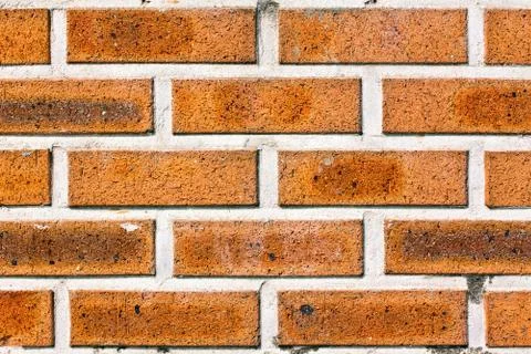 Bright red brick wall background Stock Photos