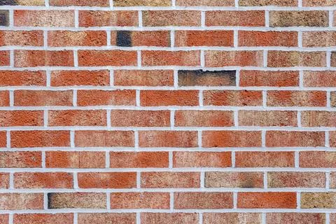 Bright red brick wall Stock Photos