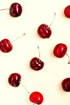 Bright red cherry on a light background Stock Photos