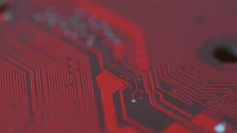 Bright red chip board moves in slow motion. Red board with chips and microcir Stock Footage 151247325