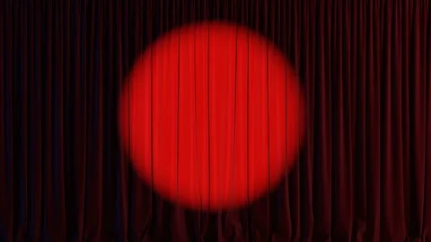 Bright red circle shines on dark curtain in theater. Empty theater stage Video stock 324874003
