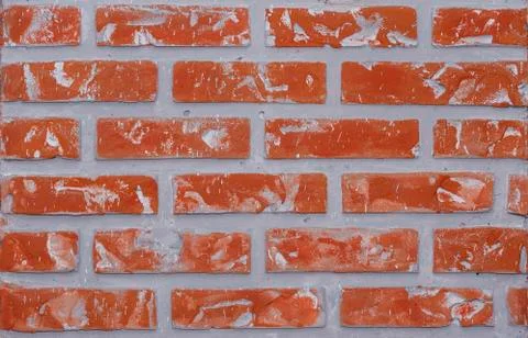 Bright red clay bricks wall flat background pattern Stock Photos