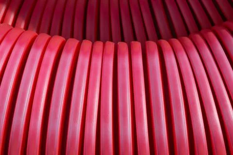 Bright Red Corrugated Plastic Cable Conduit Close-up Stock Photos