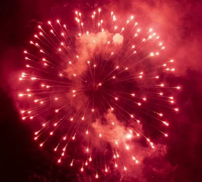 Bright red firework Stock Photos