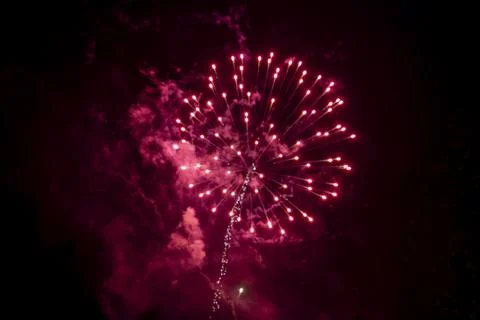 Bright red firework Stock Photos