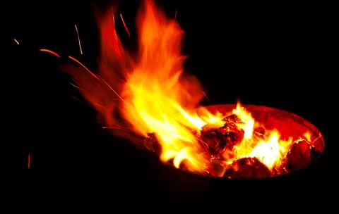 Bright red flame burning in a container Stock Photos