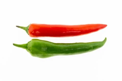 Bright red green pepper parallel pods mature vegetable on isolated background Foto stock
