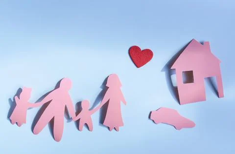 Bright red human figures, a house with a car and a bright red heart . Stock Photos