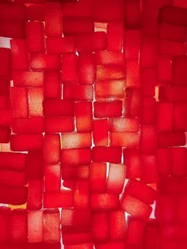 Bright red jelly candies of a rectangular shape all over the background Stock Photos