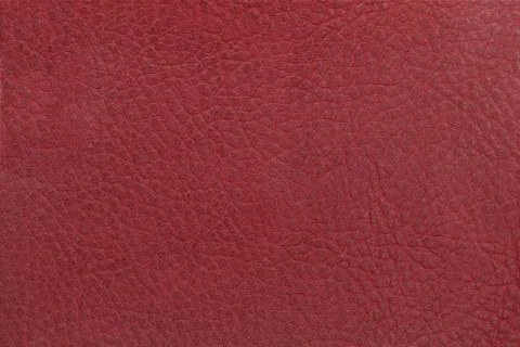 Bright red leather texture background. Closeup photo. Foto stock