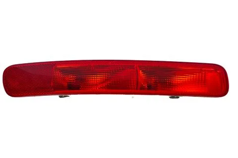 Bright red LED brake light glowing on vehicle rear. Automotive safety Stock Photos