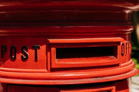 Bright red mailbox close up Foto stock