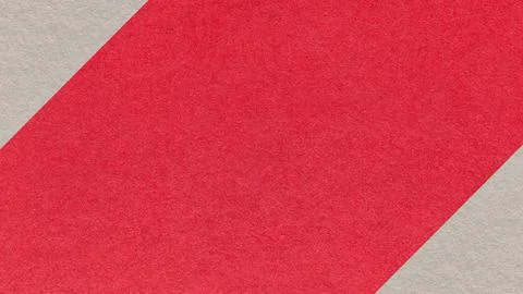 Bright red paper texture background with light beige corners and copy space.. Foto stock