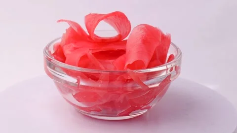 Bright red pickled ginger, rotation in circle. pickled ginger Stock Footage 277576856