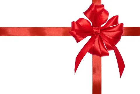 A bright red satin bow and ribbon intersecting in the center, on an isolate.. 스톡 사진