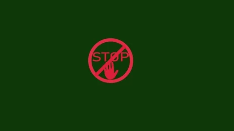 Bright red stop sign with crossed circle on dark green background Stock Footage 333782954