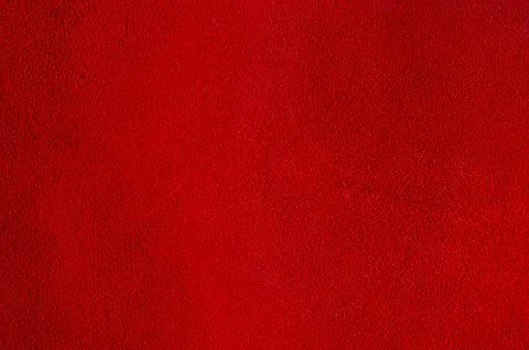 Bright red suede texture as a background. Stock Photos
