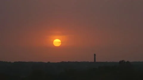 Bright red sunset with beautiful clear sun timelapse Stock Footage 146143791