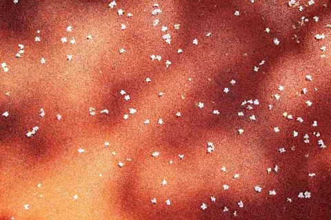 Bright red surface with scattered white flowers on a sunny day Generative AI Fotos de archivo