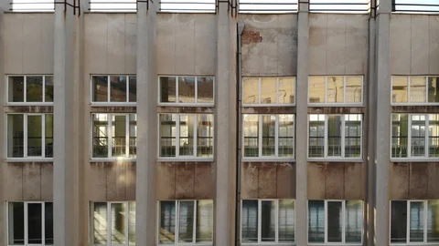Bright reflections in large windows on monumental building concrete wall Video stock 89538881