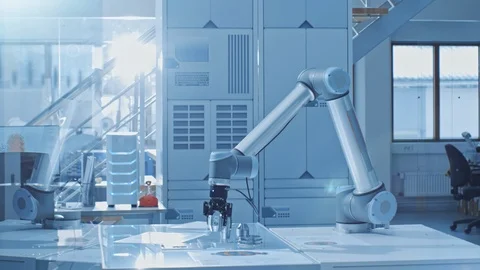 In the Bright Robotic Industry Engineering Facility Robot Arm Picks Up Detail Stock Footage 105355703